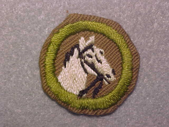 ANIMAL INDUSTRY, MERIT BADGE WITH CRIMPED EDGE, TAN, ISSUED 1936-45