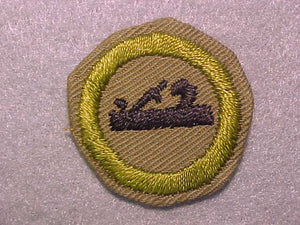 CARPENTRY, MERIT BADGE WITH CRIMPED EDGE, TAN, ISSUED 1936-45