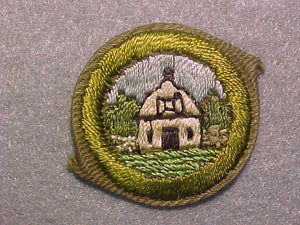 FARM LAYOUT AND BUILDING ARRANGEMENT, MERIT BADGE WITH CRIMPED EDGE, TAN, ISSUED 1936-45