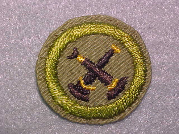 FIREMANSHIP, MERIT BADGE WITH CRIMPED EDGE, TAN, ISSUED 1936-45