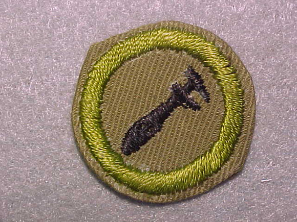 MACHINERY, MERIT BADGE WITH CRIMPED EDGE, TAN, ISSUED 1936-45