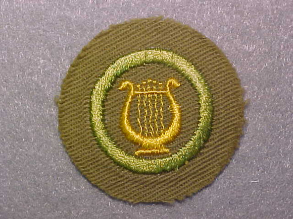 MUSIC, MERIT BADGE WITH CRIMPED EDGE, TAN, ISSUED 1936-45
