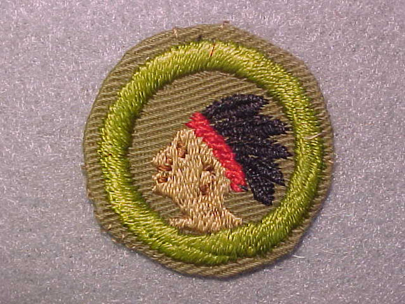 PATHFINDING, MERIT BADGE WITH CRIMPED EDGE, TAN, ISSUED 1936-45