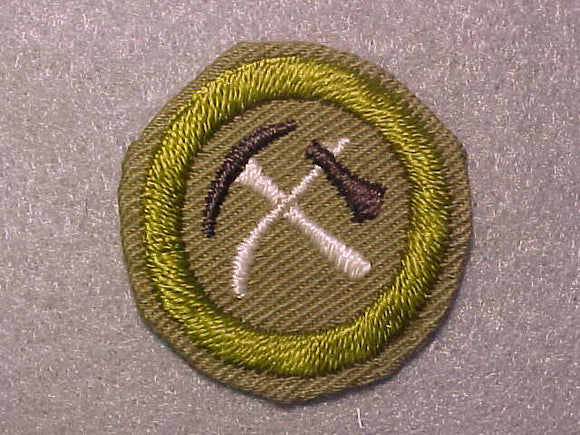 PIONEERING, MERIT BADGE WITH CRIMPED EDGE, TAN, ISSUED 1936-45