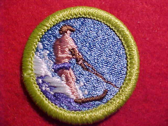 WATER SKIING, MERIT BADGE WITH CLEAR PLASTIC BACK, GREEN BORDER, NO IMPRINTS/LOGOS IN PLASTIC, 1972-95, NO LIFE JACKET