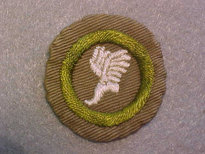 ATHLETICS MERIT BADGE, WIDE BORDER CRIMPED, ISSUED 1932-36, USED