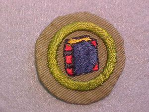 BOOKBINDING MERIT BADGE, WIDE BORDER CRIMPED, ISSUED 1932-36, USED