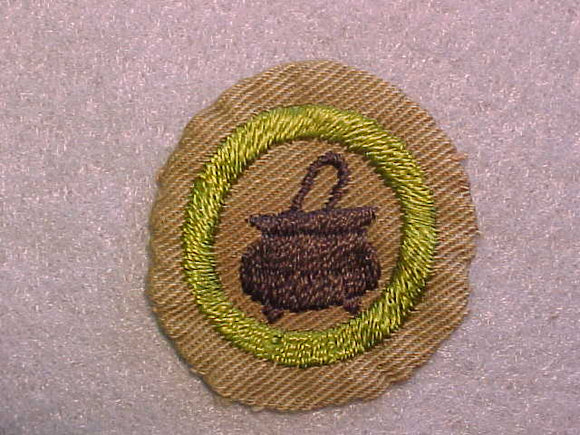 COOKING MERIT BADGE, WIDE BORDER CRIMPED, ISSUED 1932-36, USED
