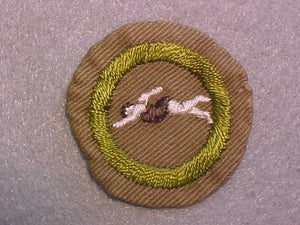 SWIMMING MERIT BADGE, WIDE BORDER CRIMPED, ISSUED 1932-36, USED