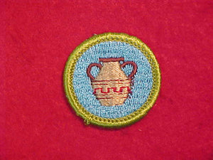 POTTERY, MERIT BADGE WITH CLOTH BACK, GREEN BORDER, 1969-72 ISSUE