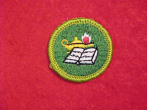 READING, MERIT BADGE WITH CLOTH BACK, GREEN BORDER, 1969-72 ISSUE