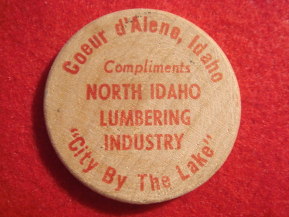 69 NJ token, wood, Coeur D'Alene, Idaho, North Idaho Lumbering Industry, 1969 NJ logo on back.