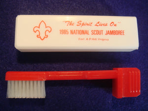 85 NJ toothbrush, army dental corps, US army health services, red handle