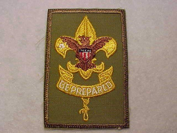 FIRST CLASS RANK, TYPE 11C, VERTICAL STITCHED SCROLL, SMOOTH TWILL, 5 TAIL FEATHERS, CLEAR PLASTIC BACK, 1965-71
