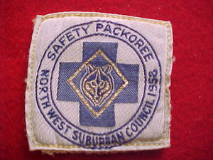 NORTHWEST SUBURBAN C. SAFETY PACKOREE, BLUE LETTERS, WOVEN, USED